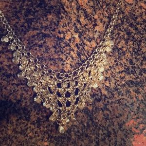 Used gold chain, good for dressing up a shirt